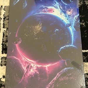 Space-Themed Metal Wall Art print with Pink and Blue Accents - packaged